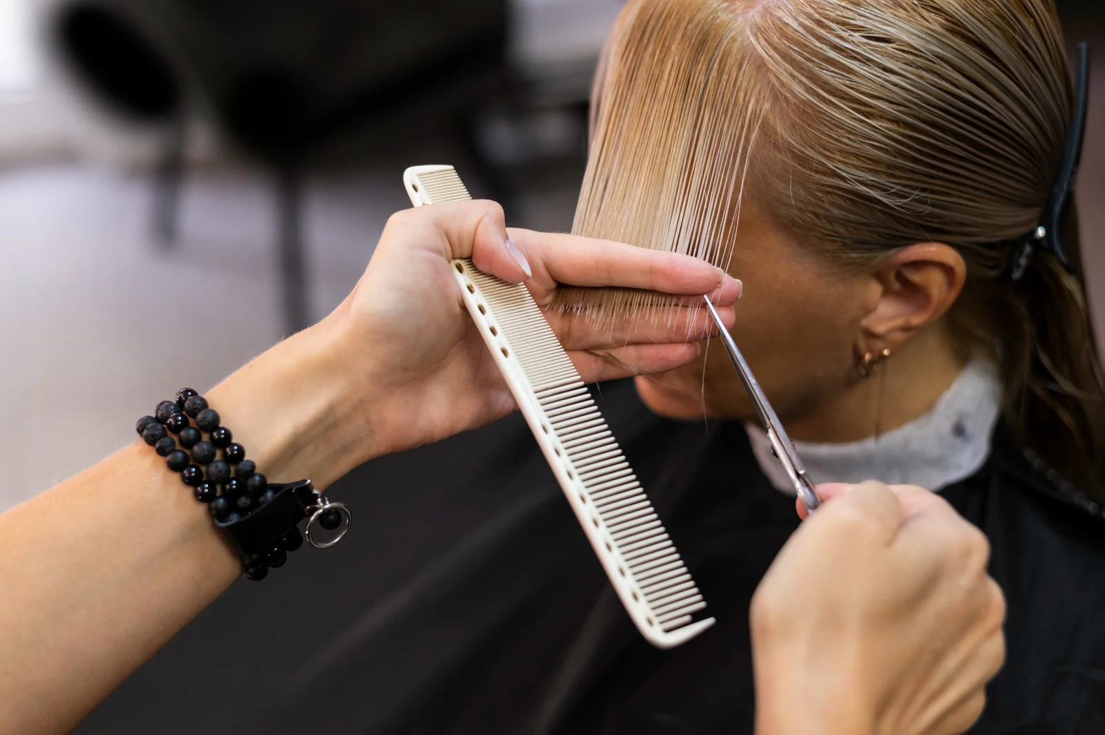 Woman getting a haircut